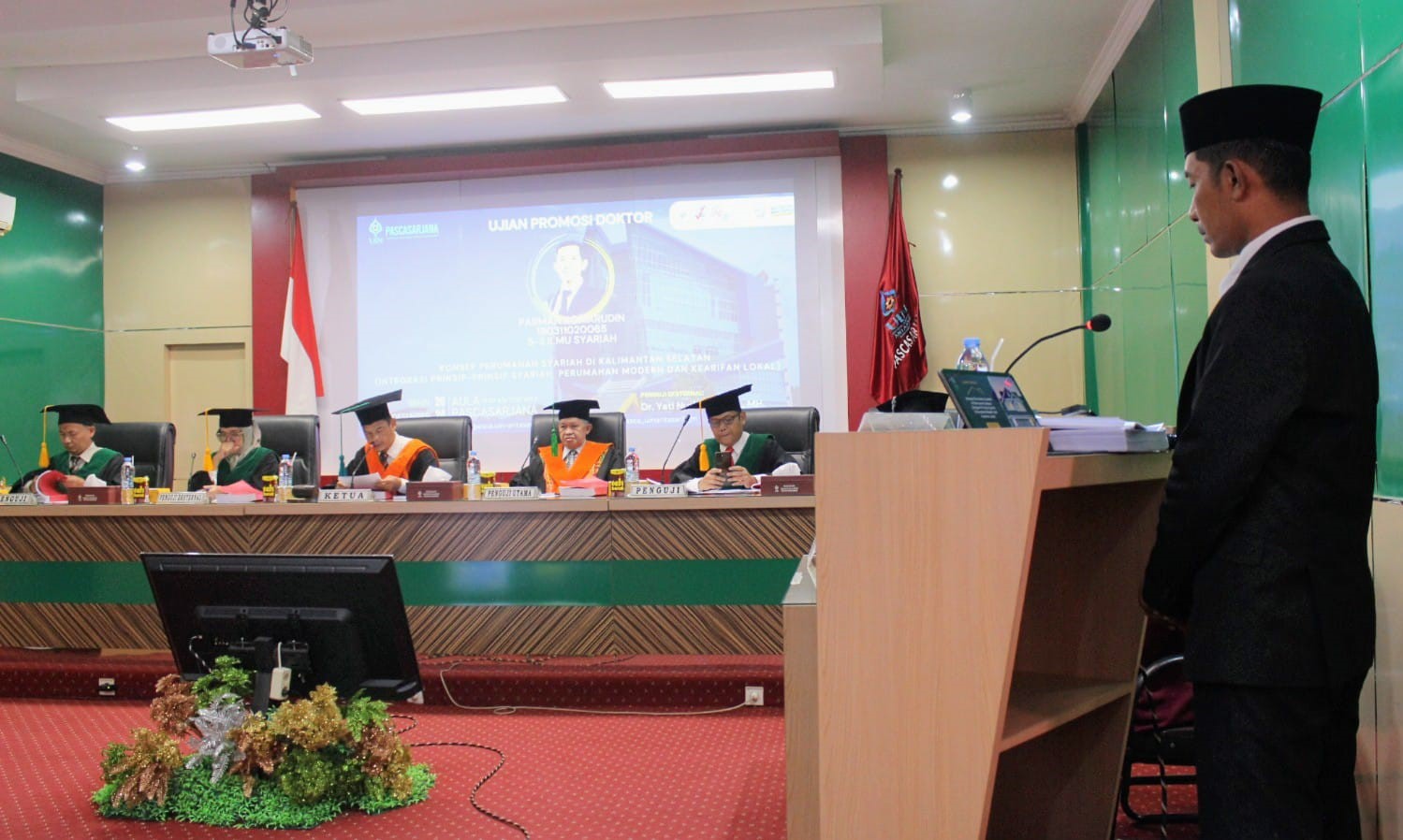 Sidang Ujian Terbuka Promosi Doktor (S3) Program Studi Ilmu Syariah yang berlangsung di Aula Pascasarjana UIN Antasari Banjarmasin, Senin (16/12/2024). Foto: siberdbn.com-Riana