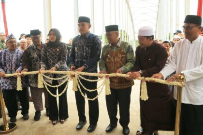 Peresmian jembatan Kualatambangan Tala. Foto:Asep/siberdbn.com